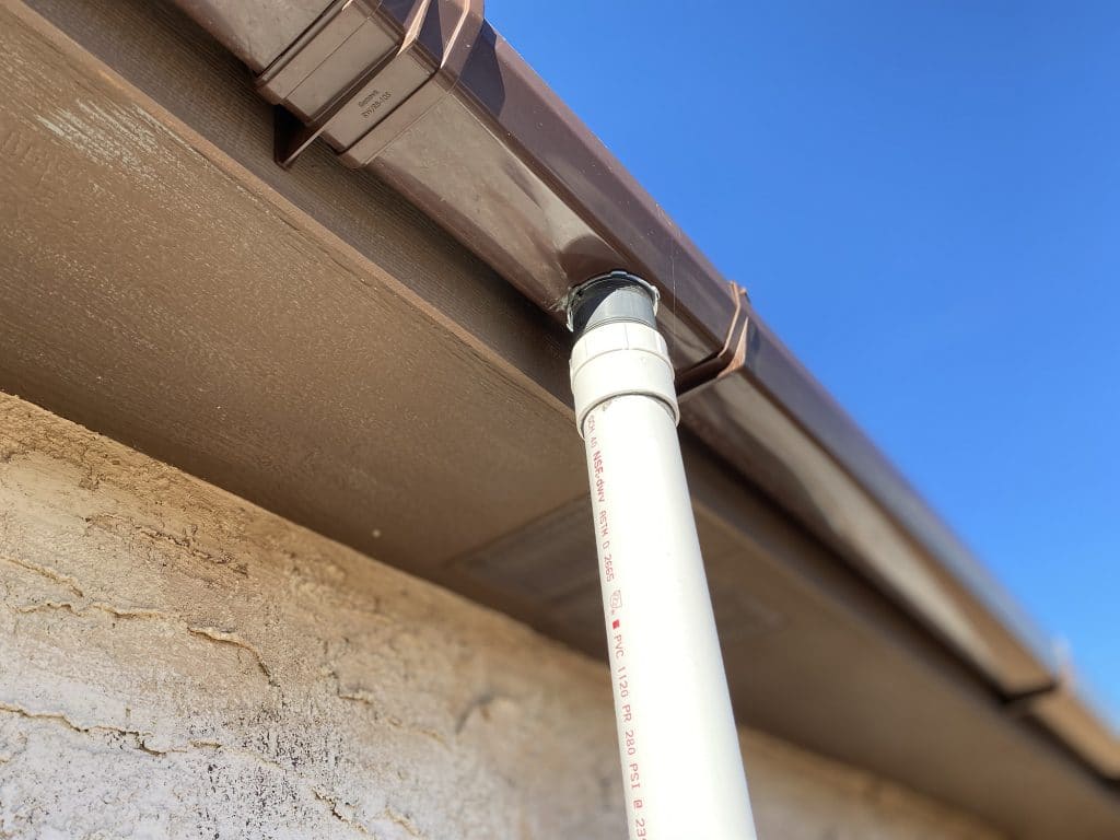 PVC downspout from gutter